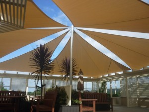 Photo of outdoor area using stainless steel shade sail fittings
